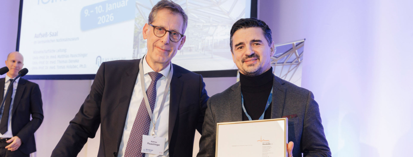 Prof. Dr. Matthias Pauschinger, Chefarzt der Kardiologie am Klinikum Nürnber am Standort Süd und stellvertretender Herzhilfe-Vorsitzender mit Preisträger Oberarzt Dr. Fadil Ademaj, Leiter des Herzkatheterlabors am Klinikum Nürnberg Süd (v.l.n.r.)